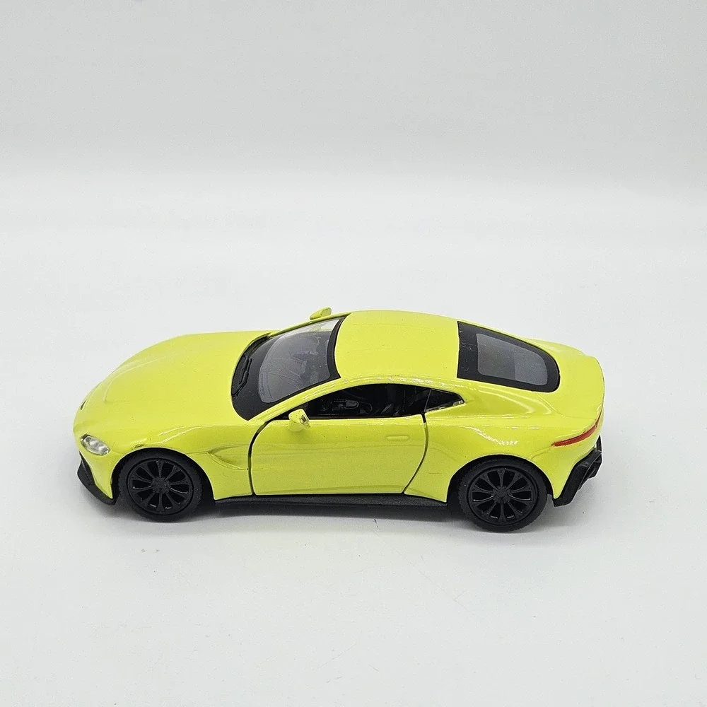 RMZ City Aston Martin Vantage Yellow Diecast Model Car 5 inch Pullback